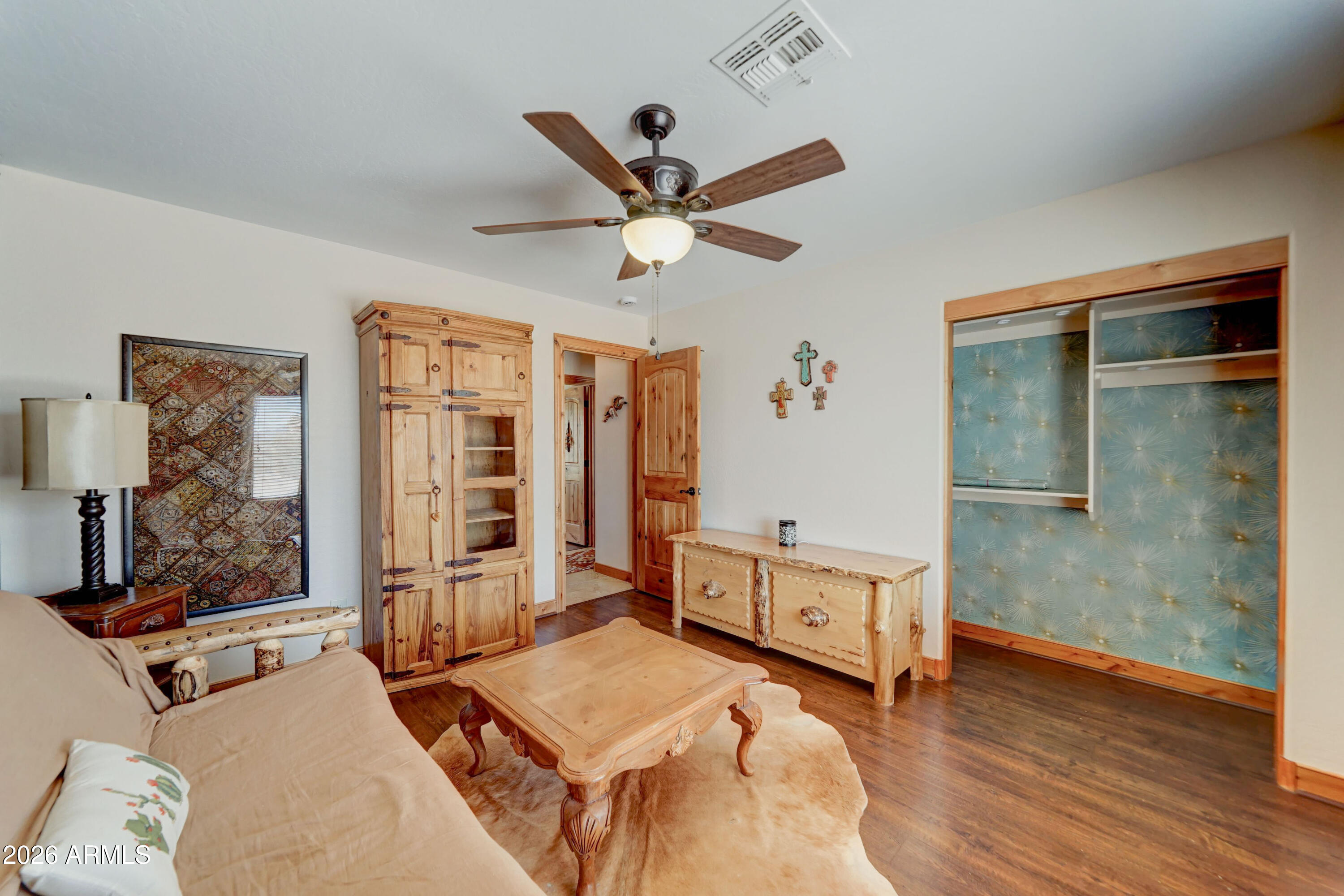 4642 North Tomahawk Road Apache Junction, AZ 85119 - Photo 22 of 41 a living room with furniture and a window