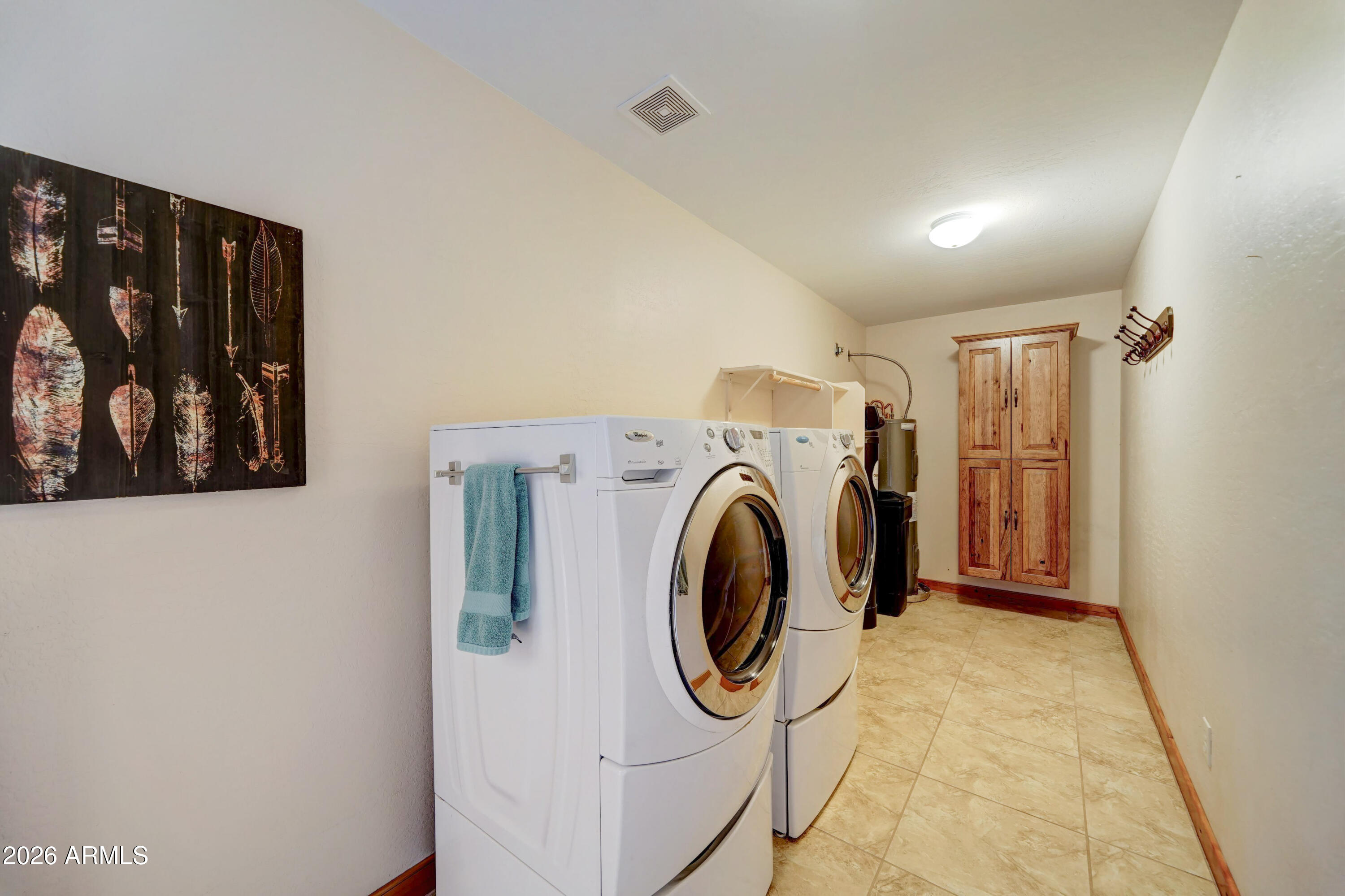 4642 North Tomahawk Road Apache Junction, AZ 85119 - Photo 24 of 41 a utility room with dryer and washer