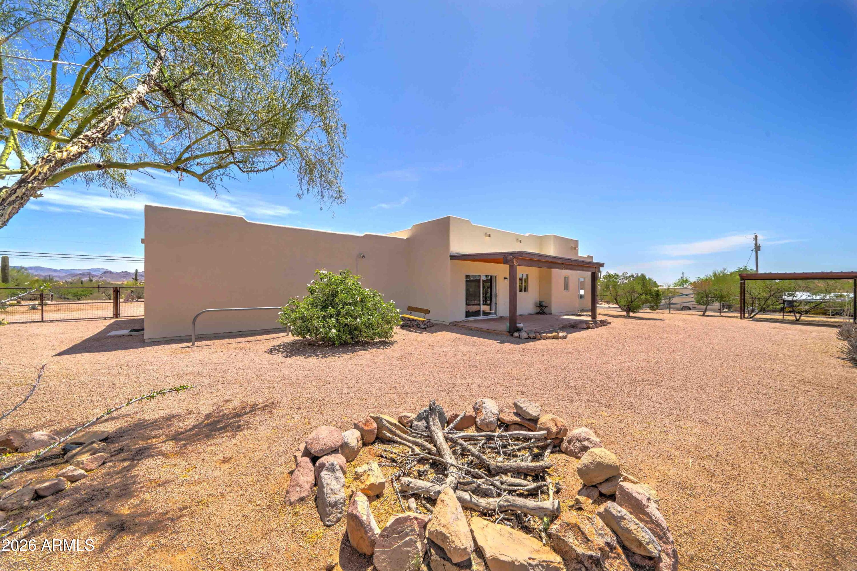 4642 North Tomahawk Road Apache Junction, AZ 85119 - Photo 28 of 41 a house with a outdoor space