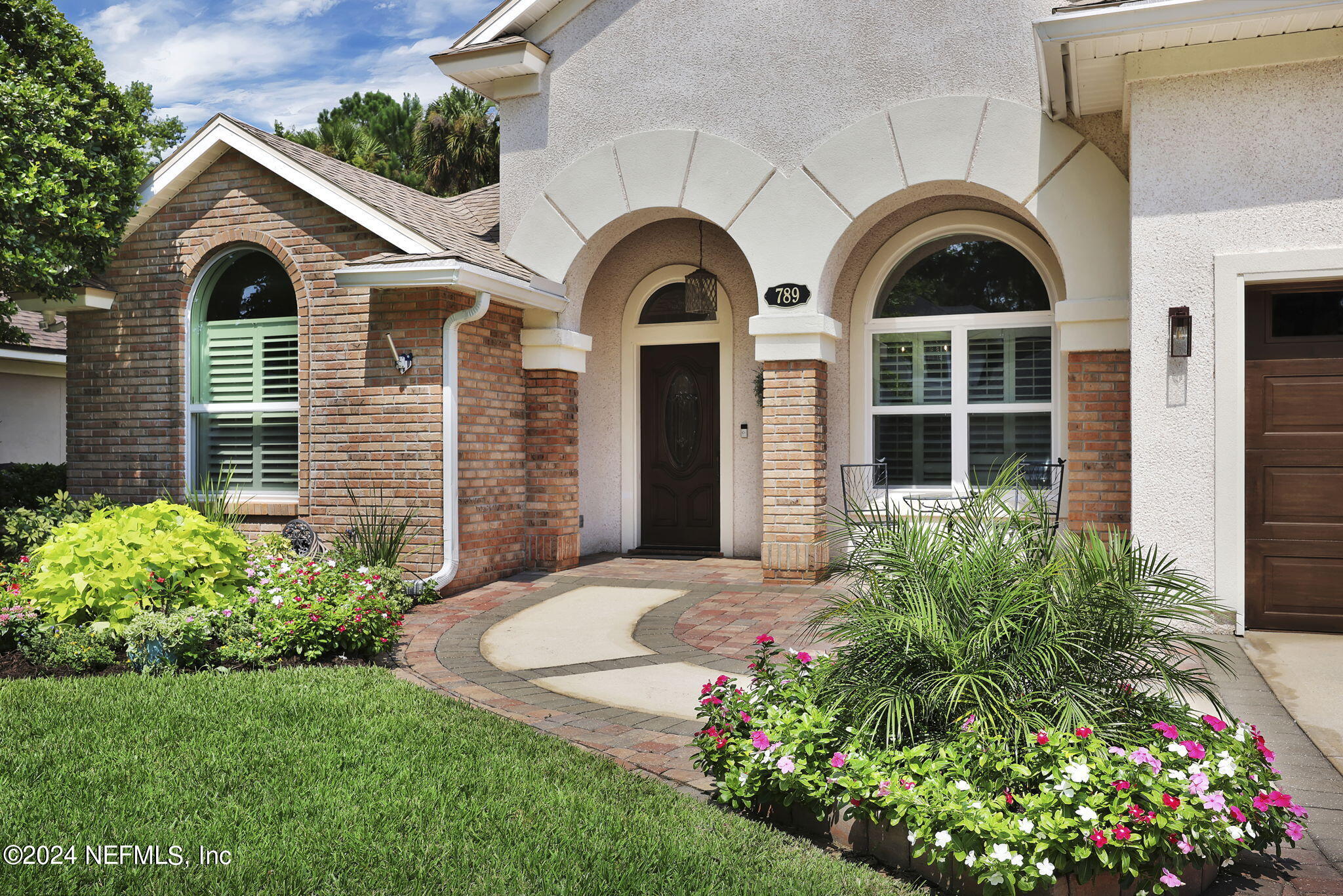 789 Mill Stream Road Ponte Vedra Beach, FL 32082 - Photo 2 of 46 a view of a house with large garden