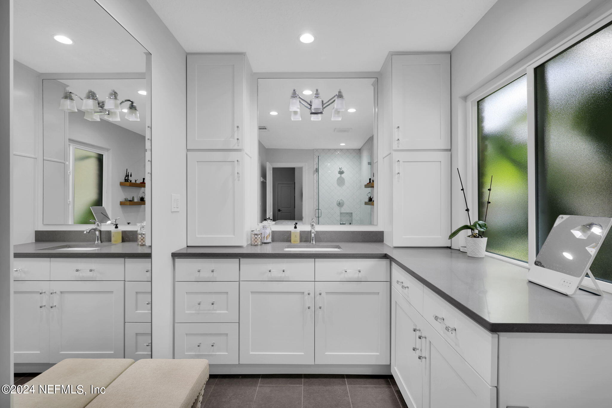 789 Mill Stream Road Ponte Vedra Beach, FL 32082 - Photo 22 of 46 a spacious bathroom with a granite countertop sink and a mirror