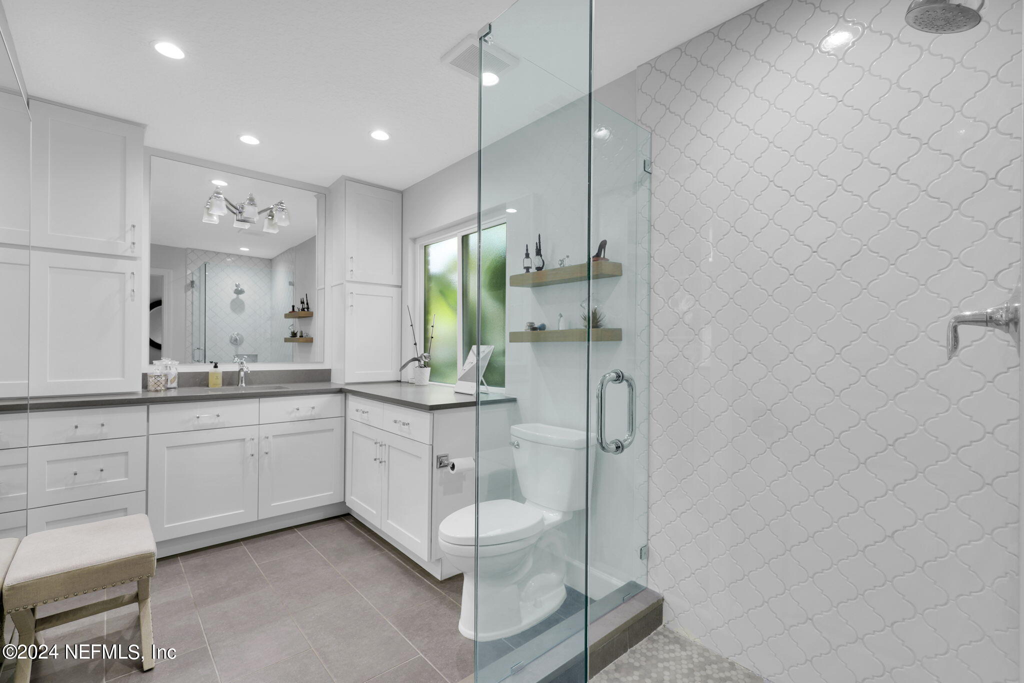 789 Mill Stream Road Ponte Vedra Beach, FL 32082 - Photo 23 of 46 a large bathroom with a double vanity sink and a mirror