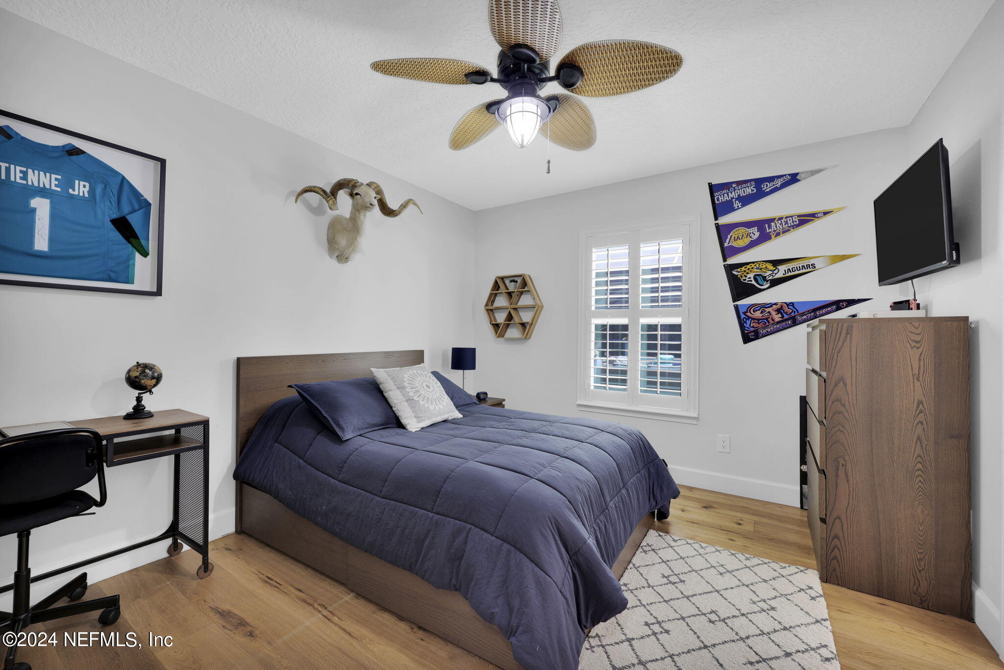 789 Mill Stream Road Ponte Vedra Beach, FL 32082 - Photo 26 of 46 a bedroom with a bed and a flat screen tv