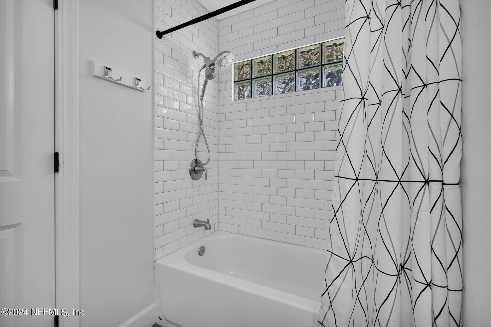 789 Mill Stream Road Ponte Vedra Beach, FL 32082 - Photo 28 of 46 a bathroom with a bathtub and shower