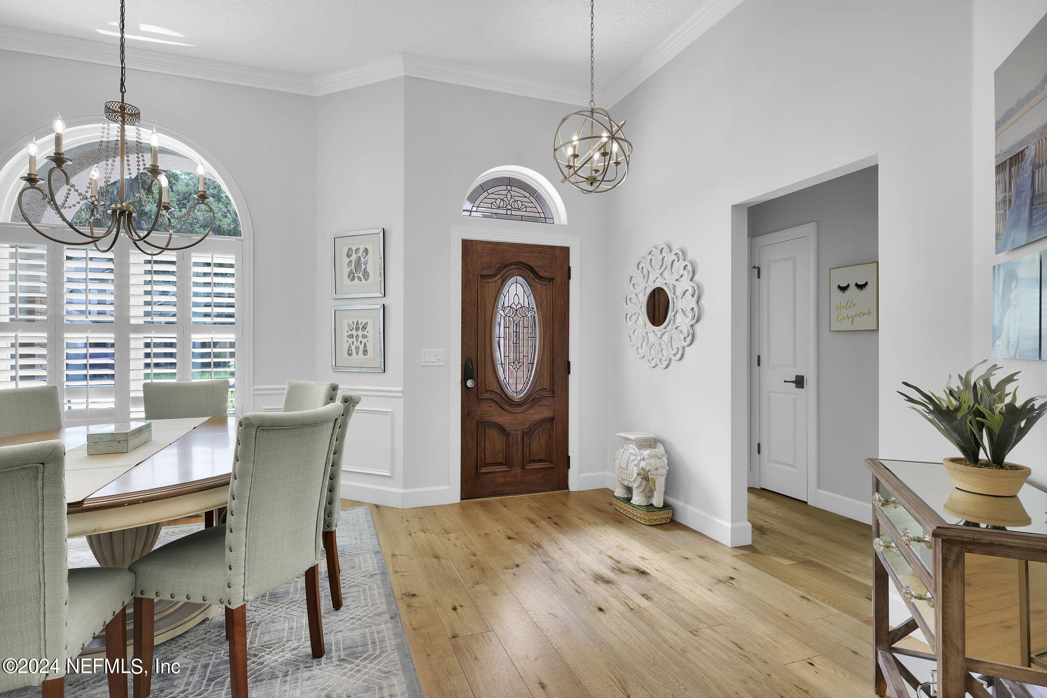 789 Mill Stream Road Ponte Vedra Beach, FL 32082 - Photo 3 of 46 a view of a dining room with furniture window and wooden floor