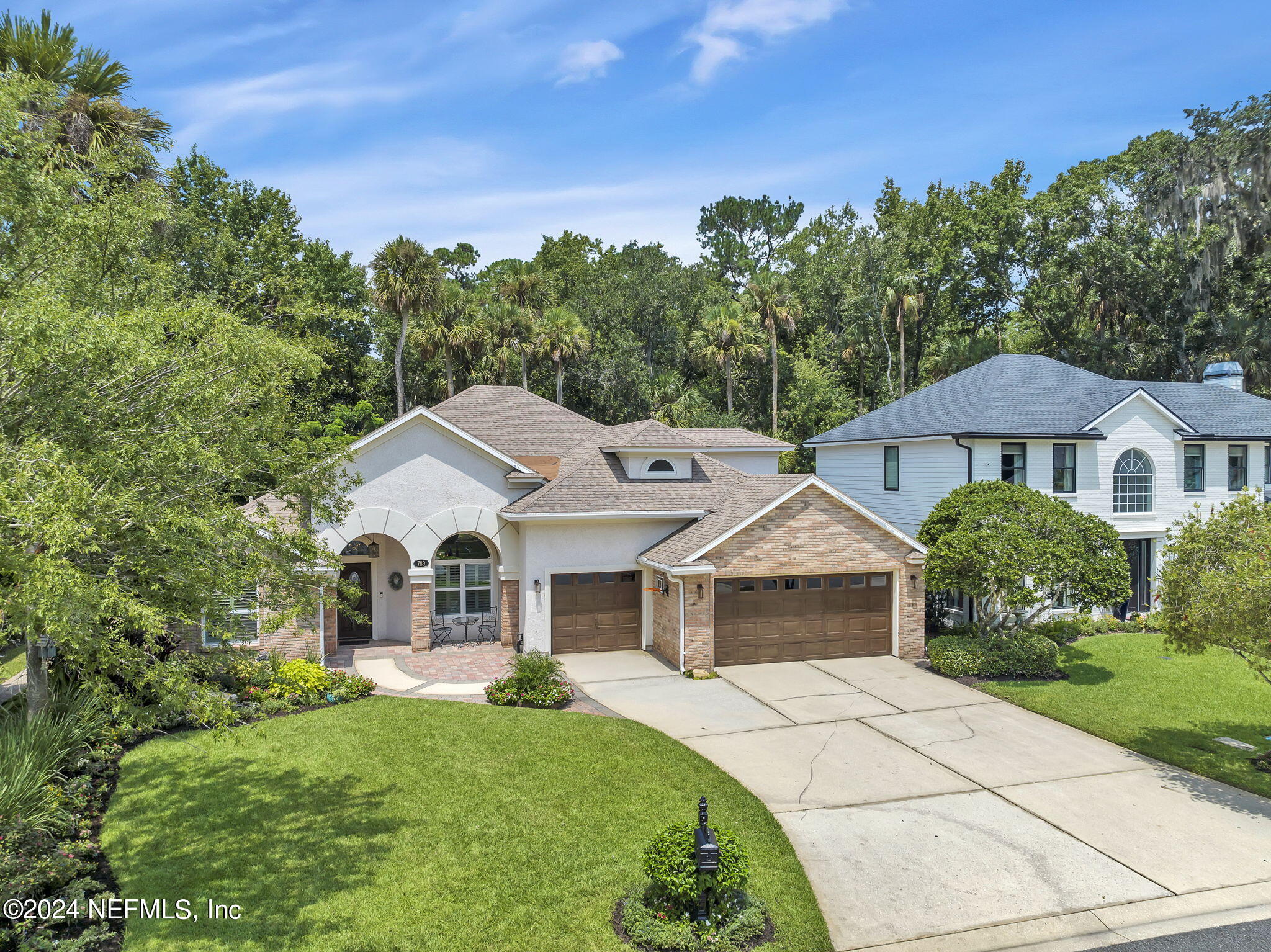789 Mill Stream Road Ponte Vedra Beach, FL 32082 - Photo 40 of 46 a front view of a house with a garden