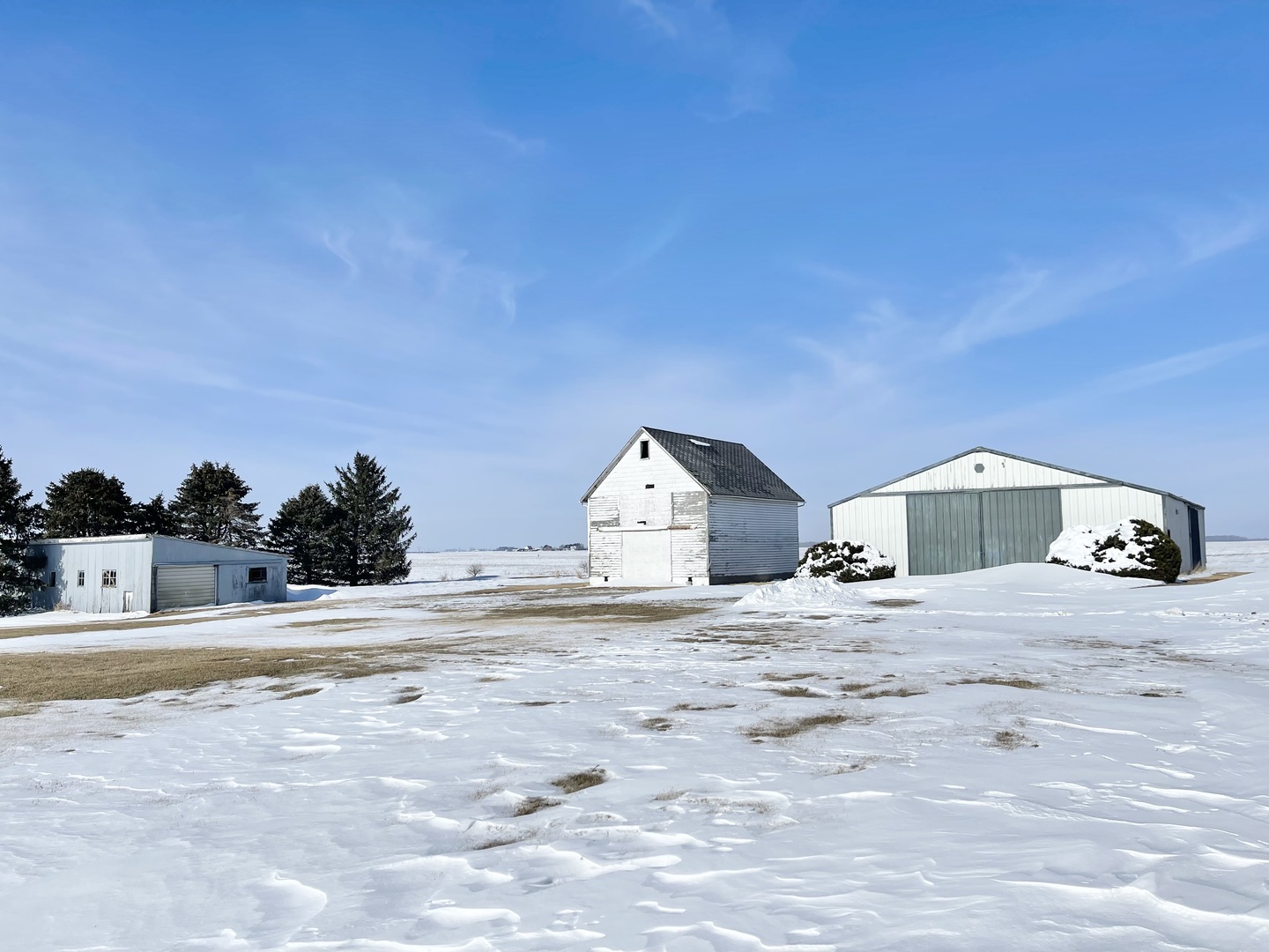 565 North 17th Road Tonica, IL 61370 - Photo 4 of 31 a big house with a large parking space and a car parked in front of it