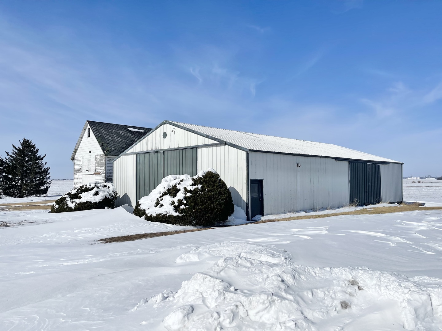 565 North 17th Road Tonica, IL 61370 - Photo 5 of 31 a front view of a house with a yard and garage