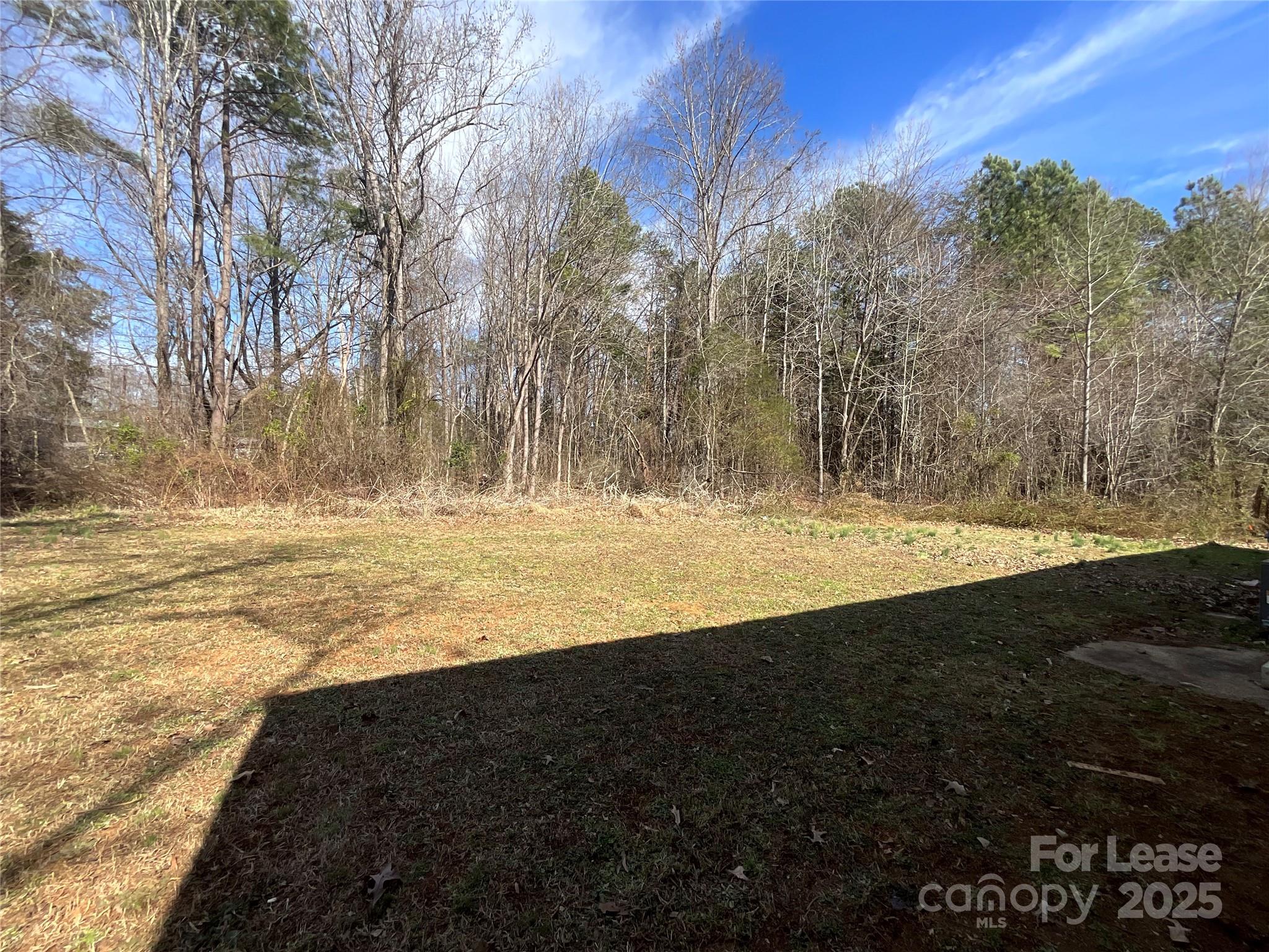 2002 Airport Road, Unit B Salisbury, NC 28147 - Photo 13 of 13 a view of outdoor space with trees