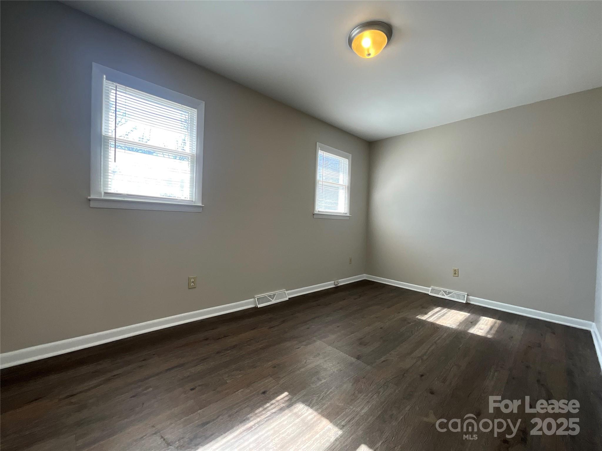 2002 Airport Road, Unit B Salisbury, NC 28147 - Photo 8 of 13 an empty room with a window