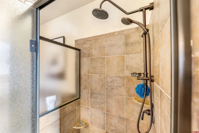a bathroom with a tub and a sink