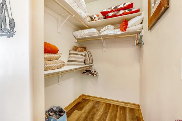 a bathroom with a double vanity sink and mirror
