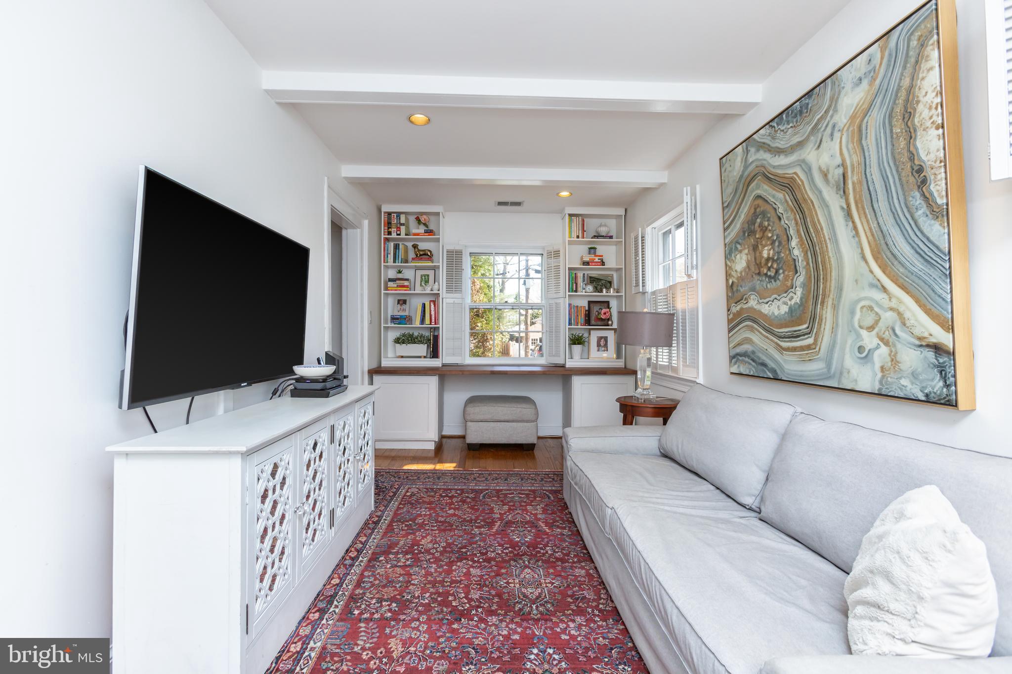 3618 Spring Street Chevy Chase, MD 20815 - Photo 12 of 39 Custom built-in bookshelves in main floor den
