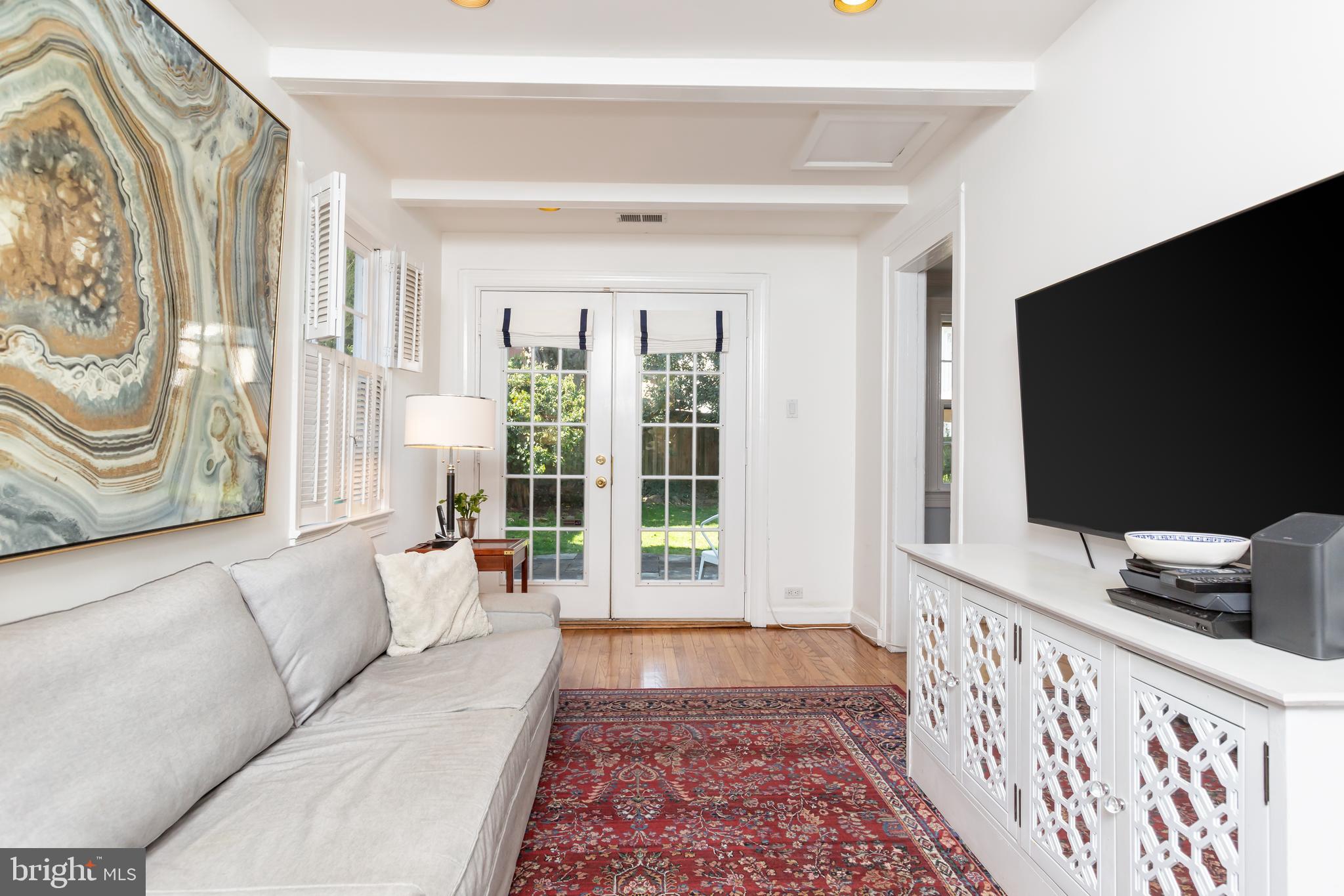 3618 Spring Street Chevy Chase, MD 20815 - Photo 13 of 39 French doors welcome to the rear patio and gardens
