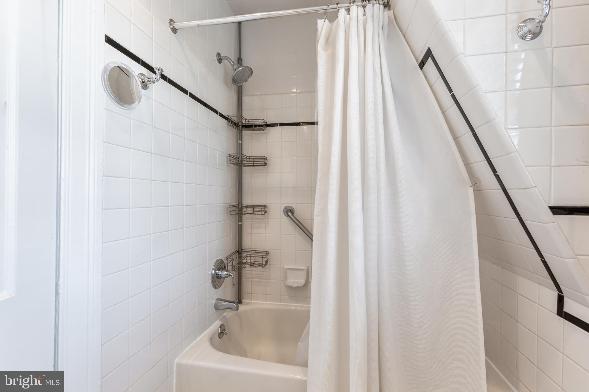 3618 Spring Street Chevy Chase, MD 20815 - Photo 27 of 39 Hall bathroom with tub and shower