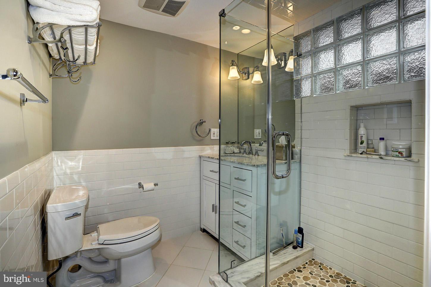 3618 Spring Street Chevy Chase, MD 20815 - Photo 28 of 39 Fully renovated lower level bathroom