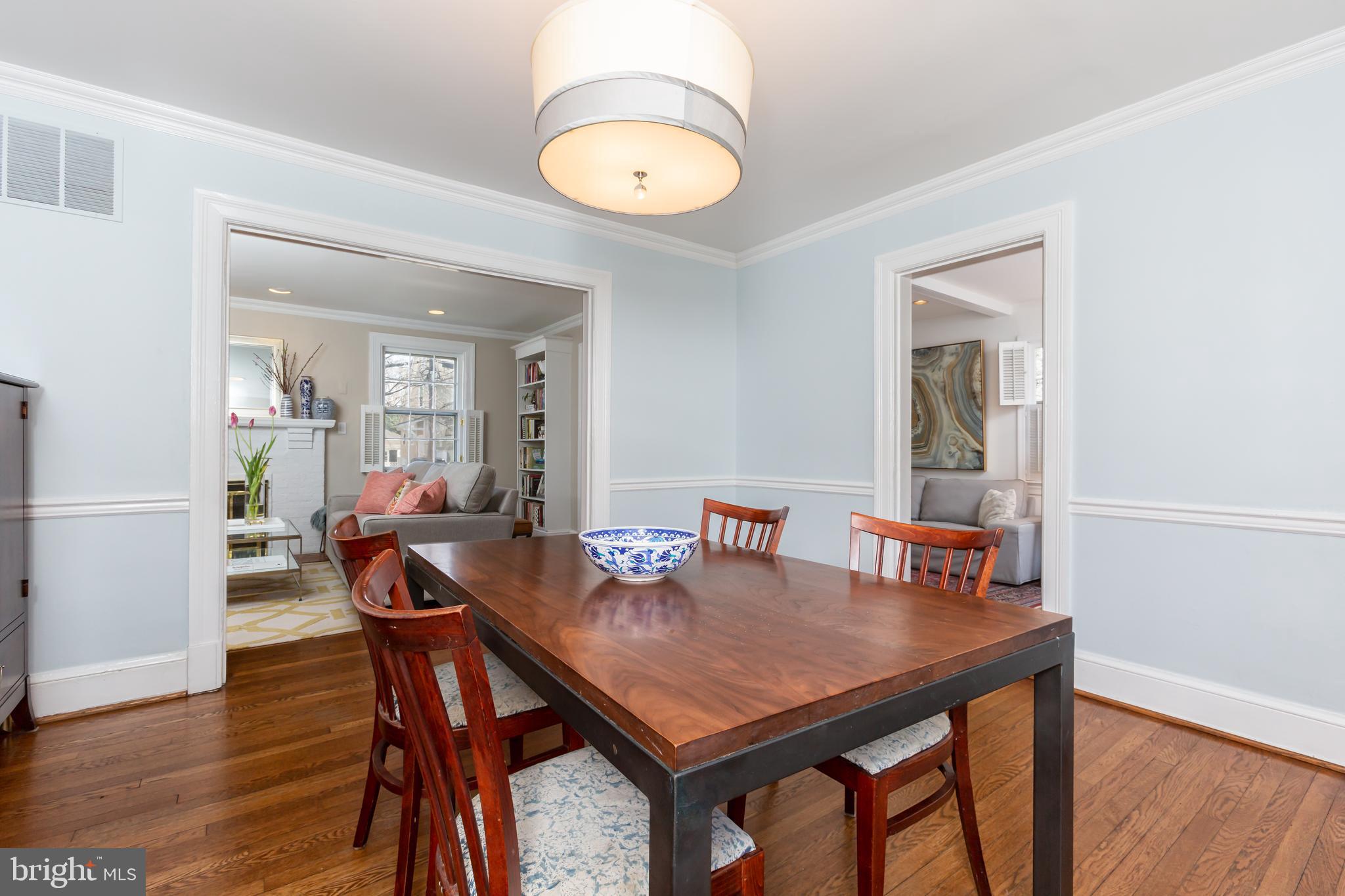 3618 Spring Street Chevy Chase, MD 20815 - Photo 9 of 39 Dining room opens to living room and sunroom