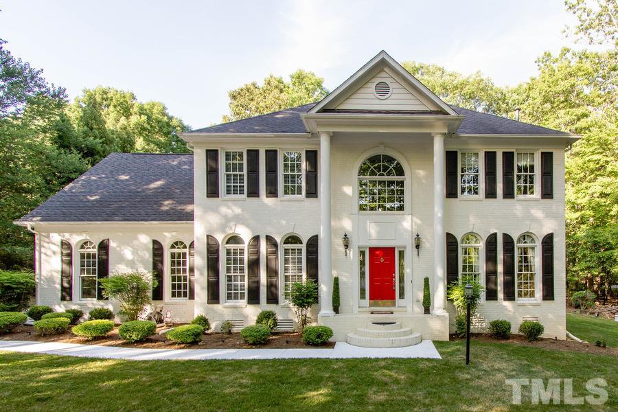 6324 Battleview Drive Raleigh, NC 27613 - Photo 1 of 25 a front view of a house with garden