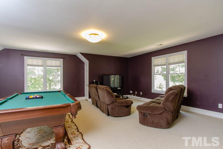 6324 Battleview Drive Raleigh, NC 27613 - Photo 20 of 25 a living room with furniture and a pool table