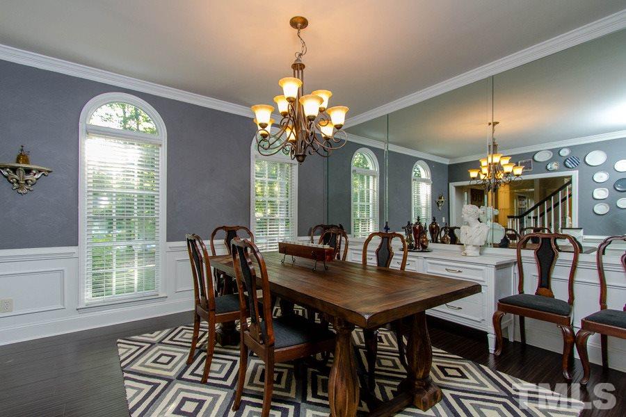 6324 Battleview Drive Raleigh, NC 27613 - Photo 4 of 25 a view of a dining room with furniture window and wooden floor