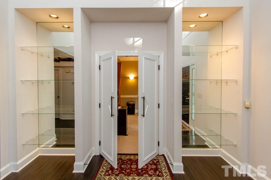 6324 Battleview Drive Raleigh, NC 27613 - Photo 5 of 25 a bathroom with a mirror and a shower