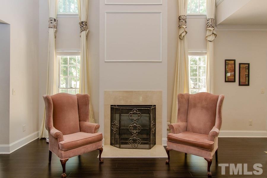 6324 Battleview Drive Raleigh, NC 27613 - Photo 7 of 25 a living room with furniture and a fireplace