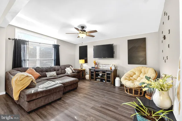 a kitchen with stainless steel appliances granite countertop a stove and cabinets