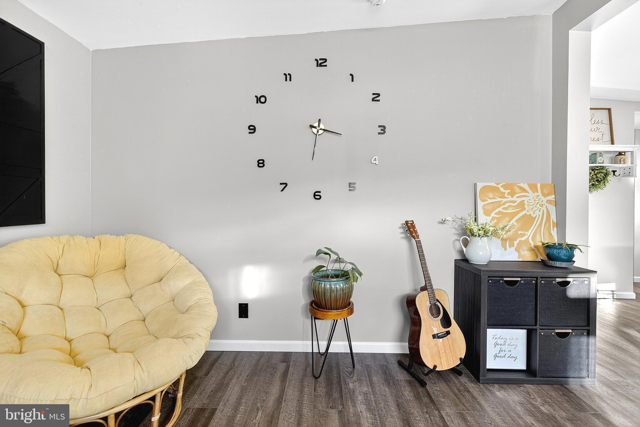108 West Commerce Street Kenton, DE 19938 - Photo 16 of 48 a view of a workspace with furniture and wooden floor