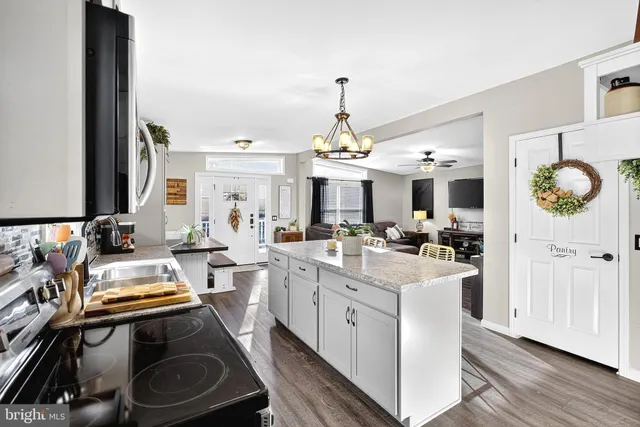a bathroom with a shower curtain and a toilet