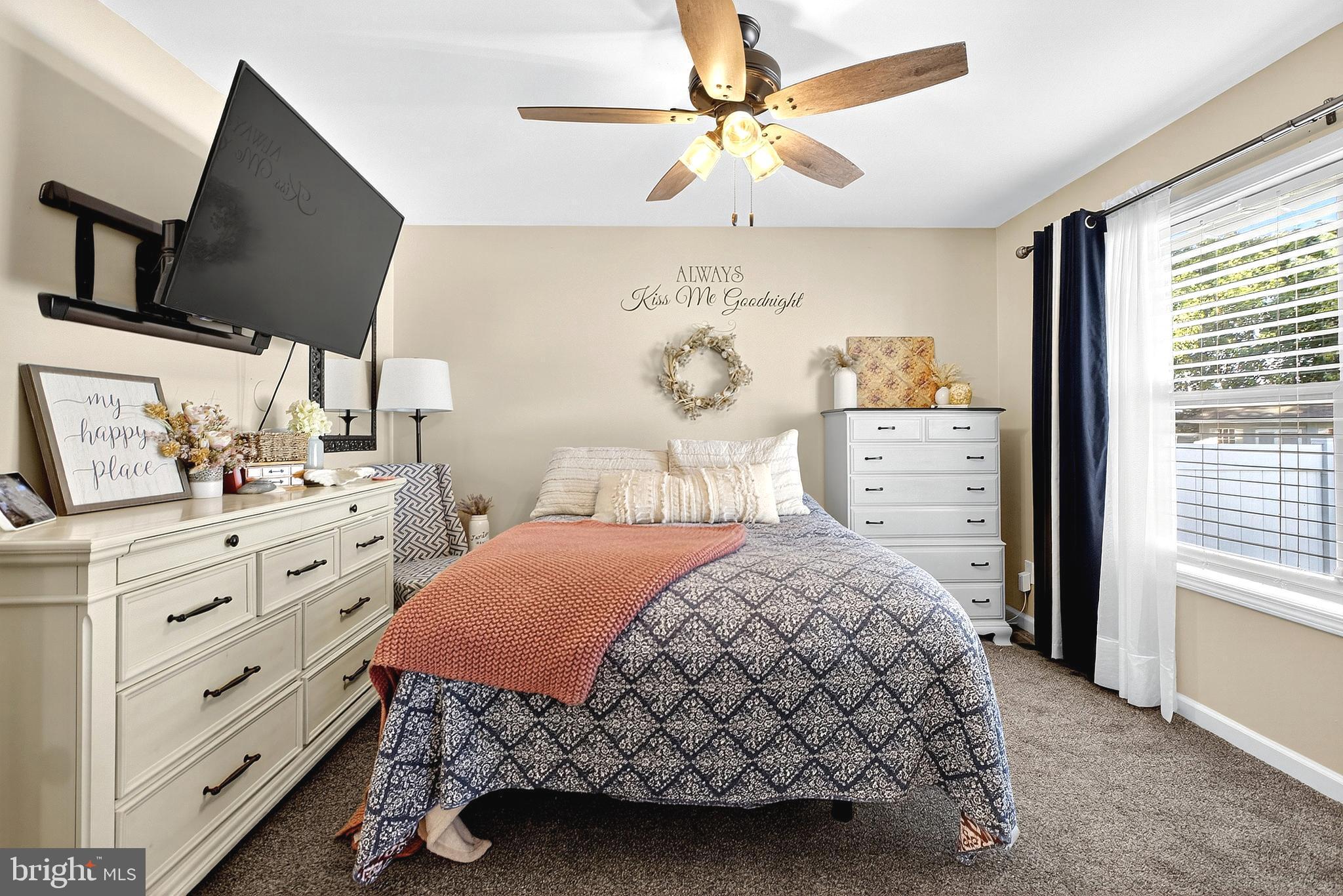 108 West Commerce Street Kenton, DE 19938 - Photo 27 of 48 a bedroom with a bed a window and dresser