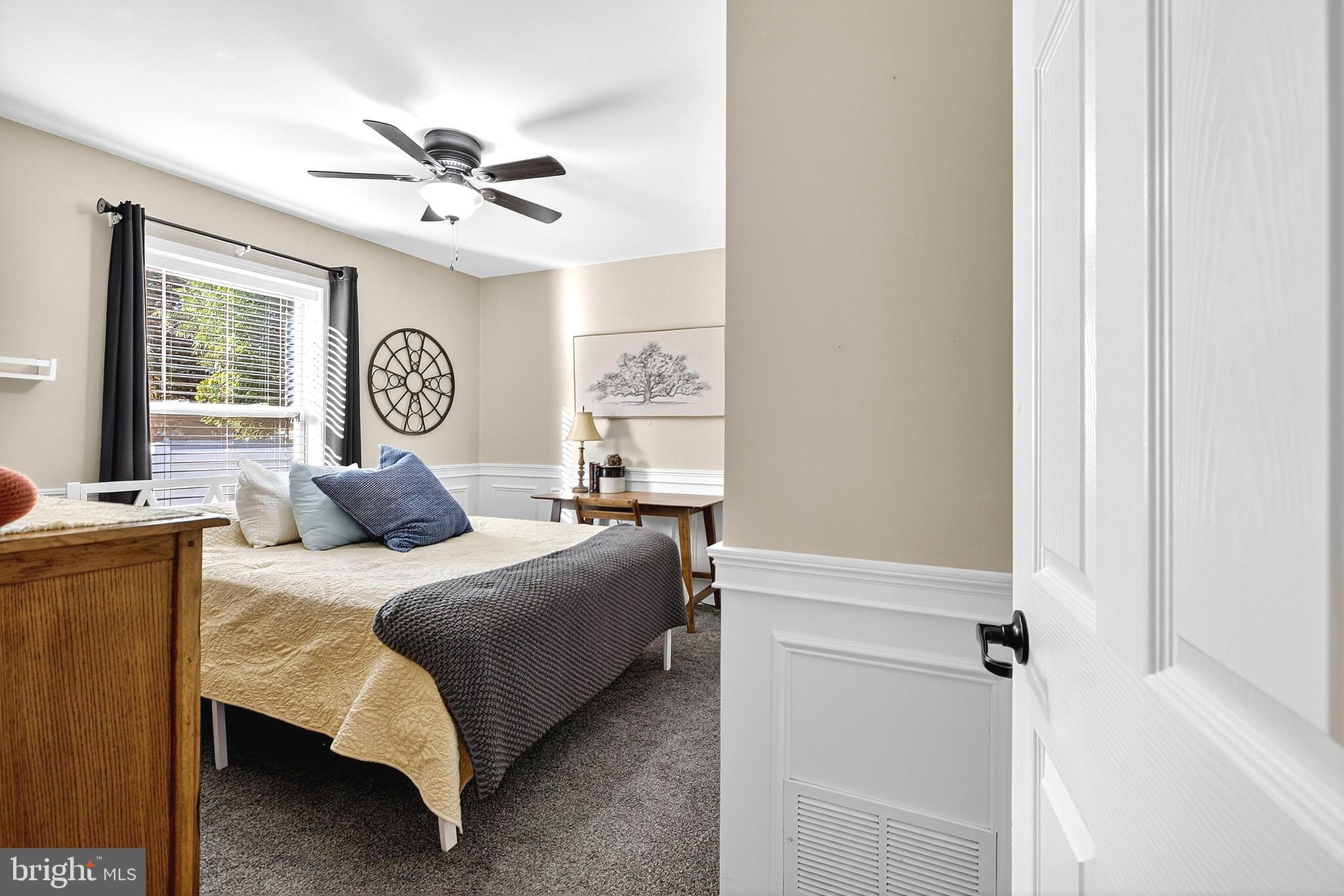 108 West Commerce Street Kenton, DE 19938 - Photo 31 of 48 a bedroom with a bed and window