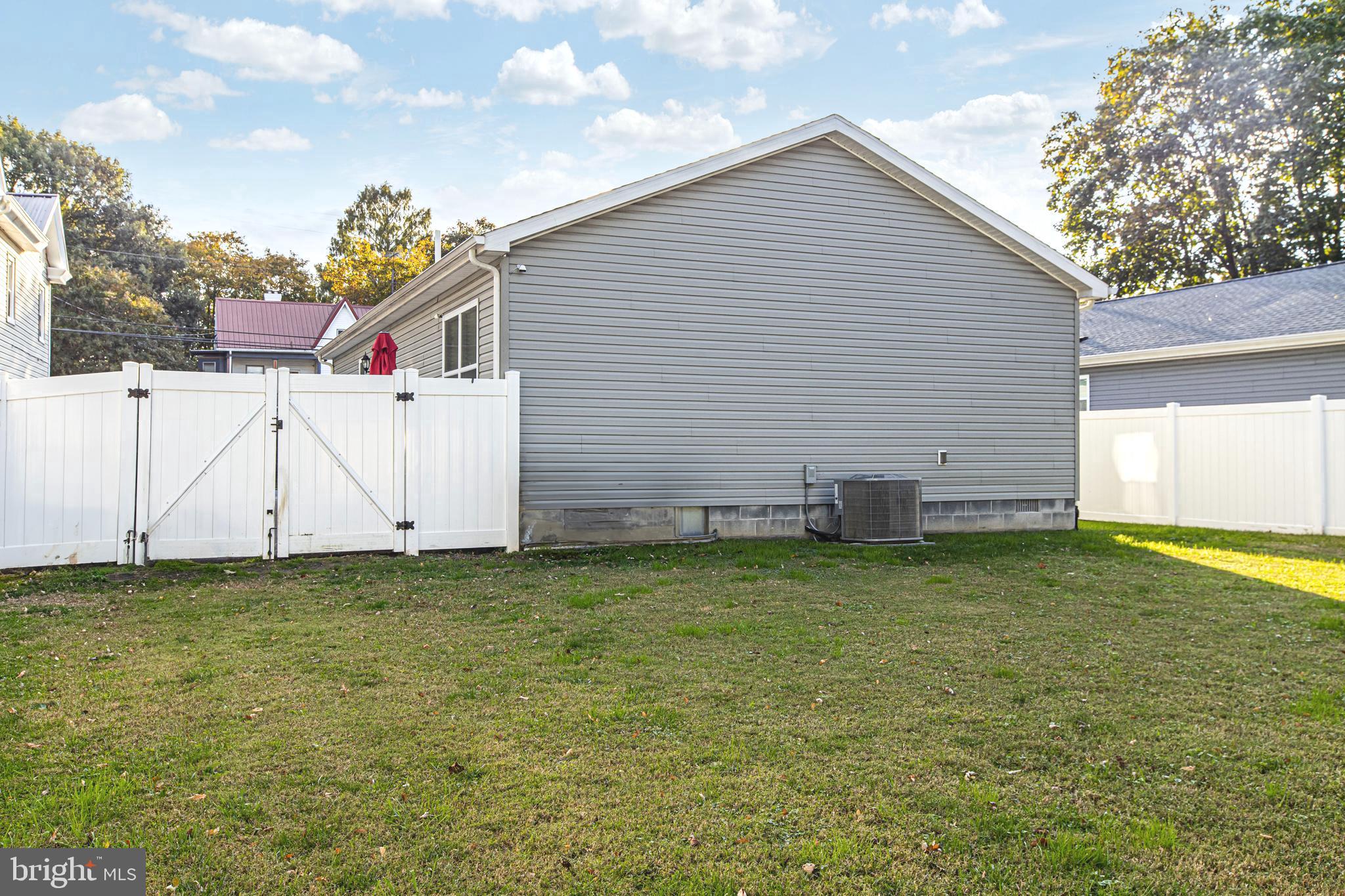 108 West Commerce Street Kenton, DE 19938 - Photo 42 of 48 a view of a backyard with a garden