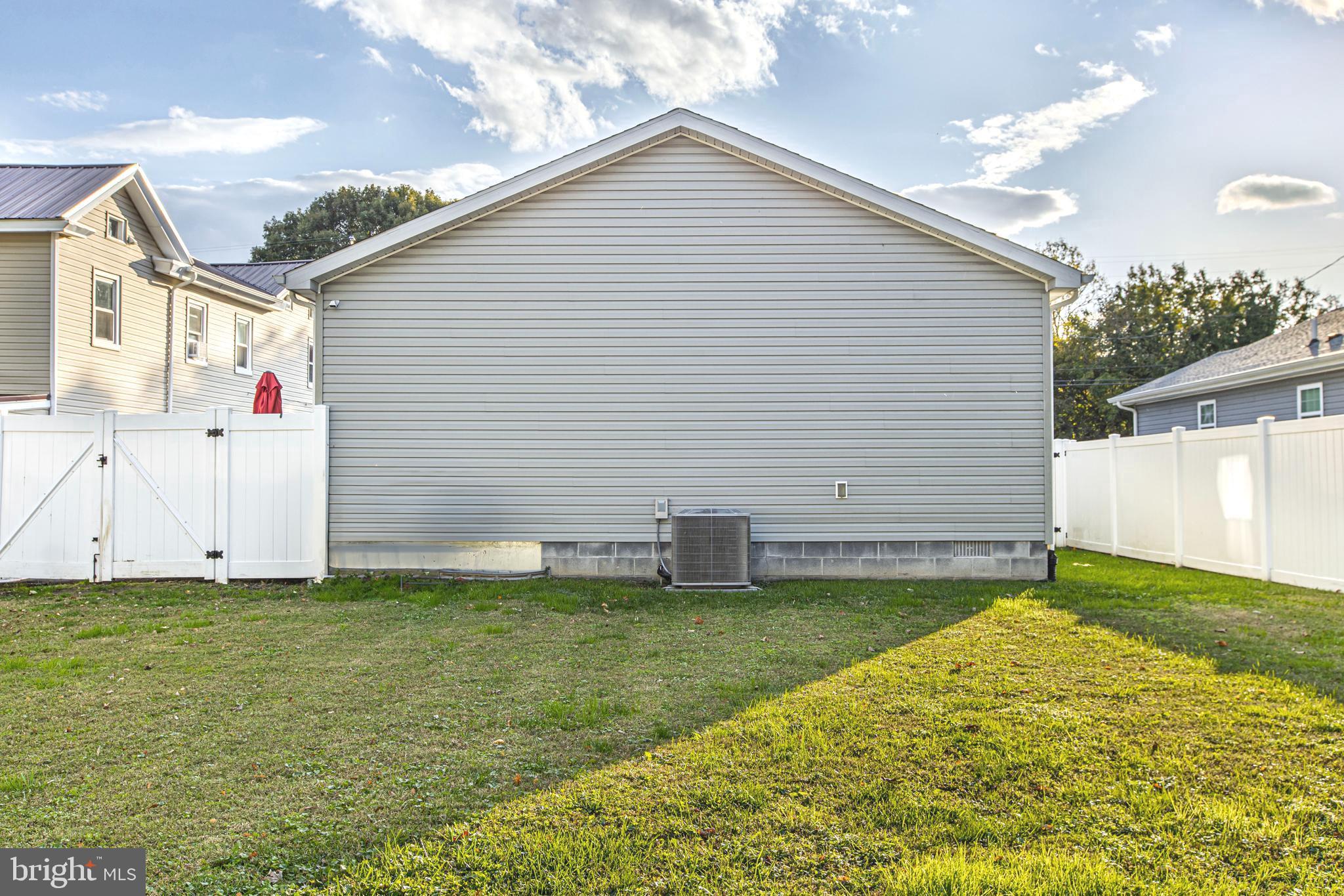 108 West Commerce Street Kenton, DE 19938 - Photo 44 of 48 a view of a backyard with a garden