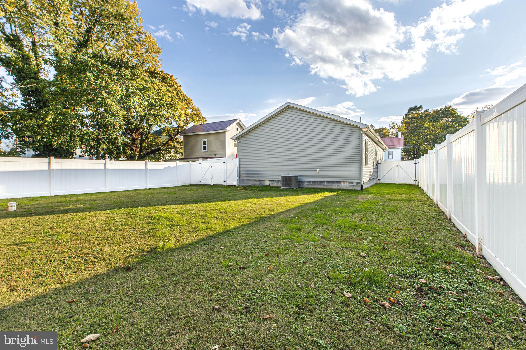 108 West Commerce Street Kenton, DE 19938 - Photo 45 of 48 a view of a house with a yard