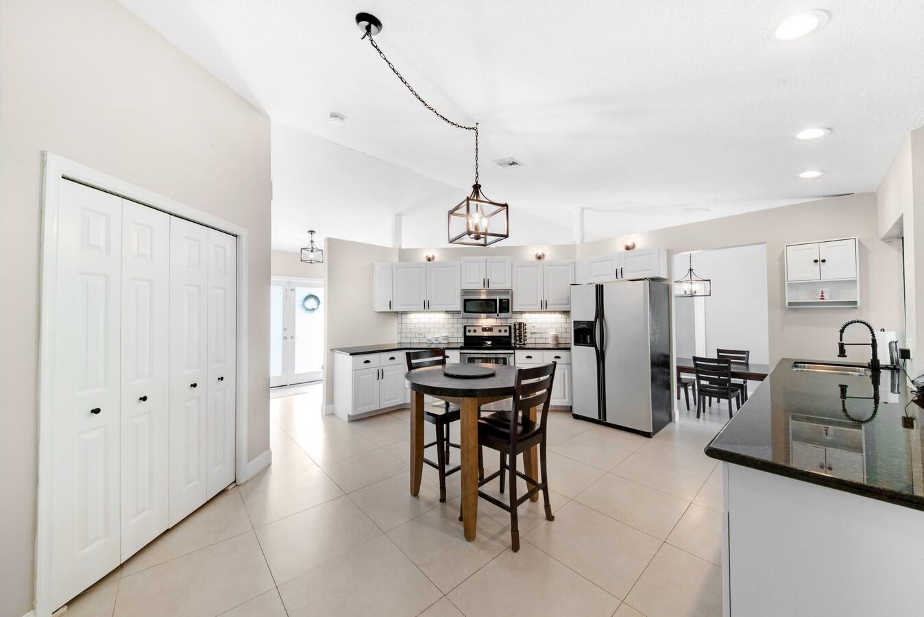 399 Apache Lane Boca Raton, FL 33487 - Photo 9 of 41 High Hat Lighting