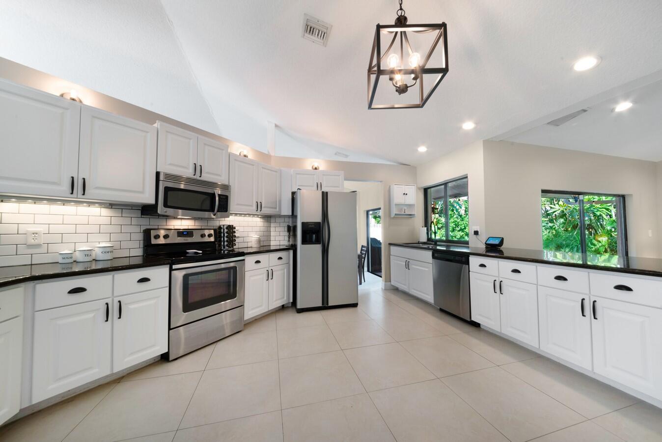 399 Apache Lane Boca Raton, FL 33487 - Photo 11 of 41 Under and Above Cabinet Lighting