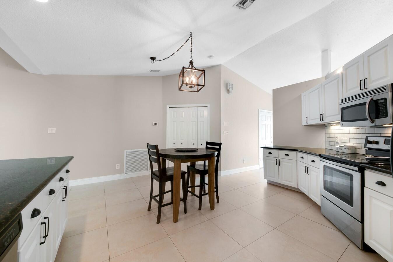 399 Apache Lane Boca Raton, FL 33487 - Photo 12 of 41 Vaulted Ceiling