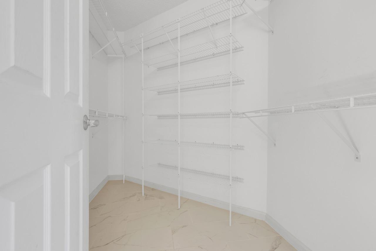 2598 Northwest 47th Street Boca Raton, FL 33434 - Photo 16 of 23 moore walkin closet
