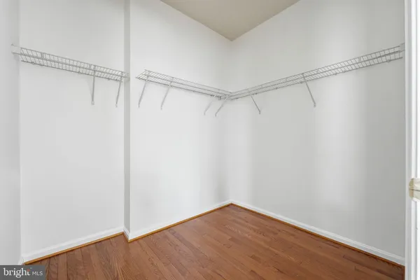 a view of an empty walk in closet