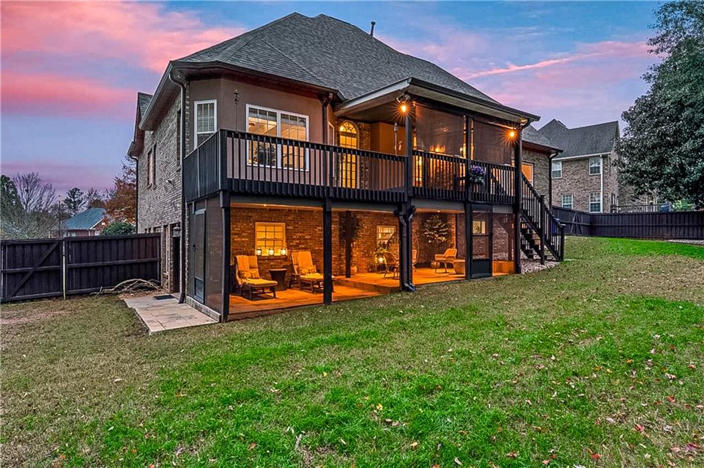 1615 Avery Drive Locust Grove, GA 30248 - Photo 41 of 49 a view of a house with a yard and a wooden deck