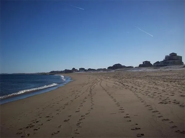 a view of ocean and mountain