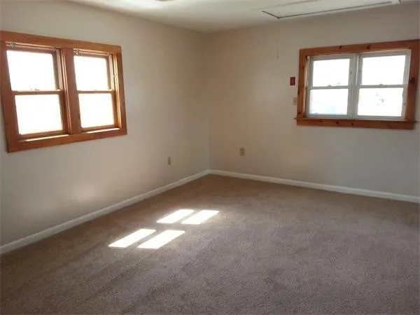 an empty room with a window
