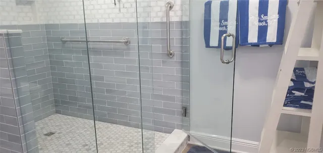 a white building with a white door