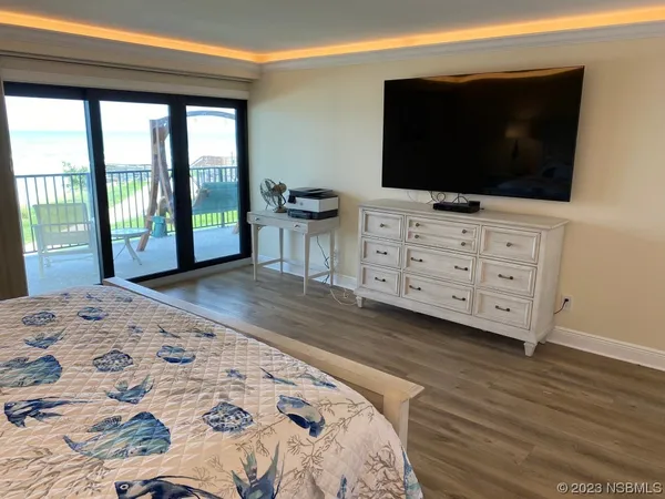 a living room with fireplace furniture and a flat screen tv