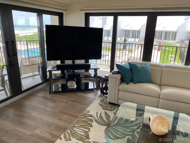 a kitchen with sink cabinets and outdoor view