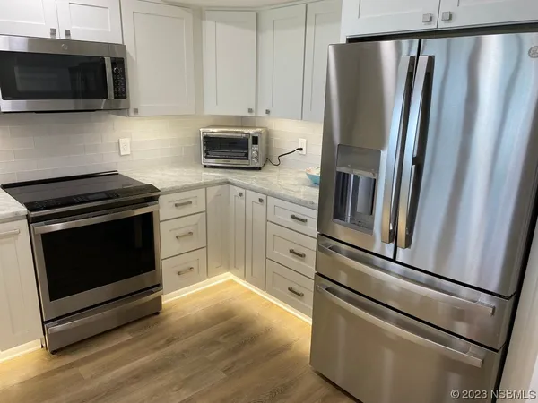 a view of swimming pool with a outdoor seating