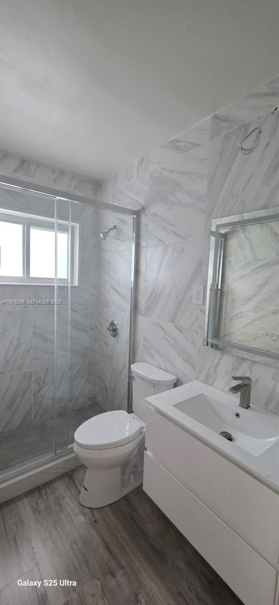 1340 Northwest 133rd Street Miami, FL 33167 - Photo 24 of 31 a bathroom with a sink toilet and shower