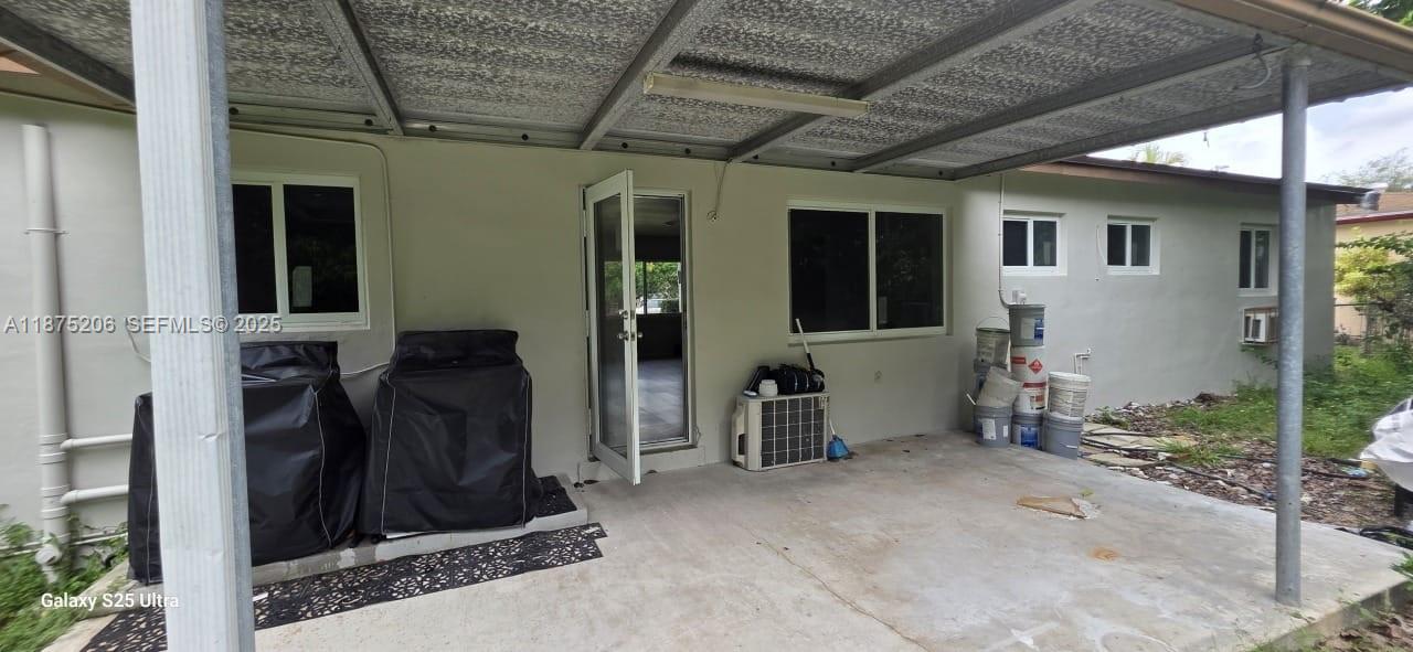 1340 Northwest 133rd Street Miami, FL 33167 - Photo 29 of 31 a view of a door of the house