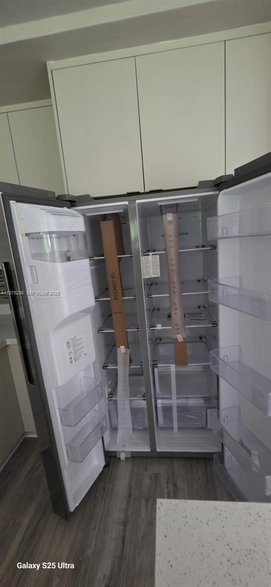 1340 Northwest 133rd Street Miami, FL 33167 - Photo 5 of 31 a view of walk in closet with clothes