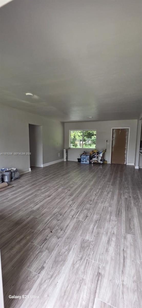 1340 Northwest 133rd Street Miami, FL 33167 - Photo 7 of 31 a view of a livingroom with wooden floor